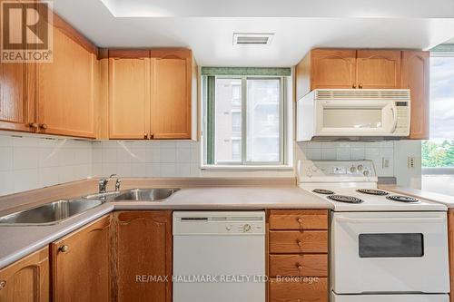 310 - 1140 Parkwest Place, Mississauga, ON - Indoor Photo Showing Kitchen With Double Sink