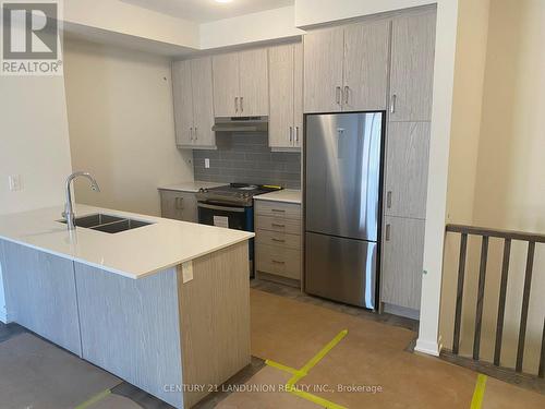 265 - 150 Honeycrisp Crescent, Vaughan, ON - Indoor Photo Showing Kitchen With Double Sink