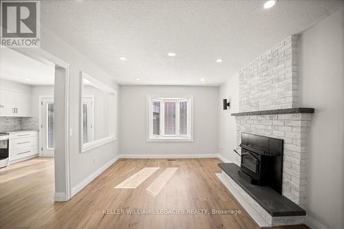 Upper - 26 Newman Court, Brampton, ON - Indoor Photo Showing Other Room With Fireplace