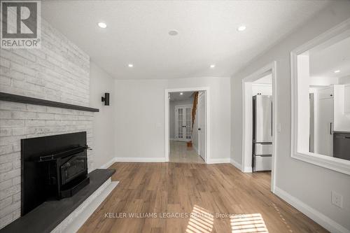 Upper - 26 Newman Court, Brampton, ON - Indoor Photo Showing Living Room With Fireplace