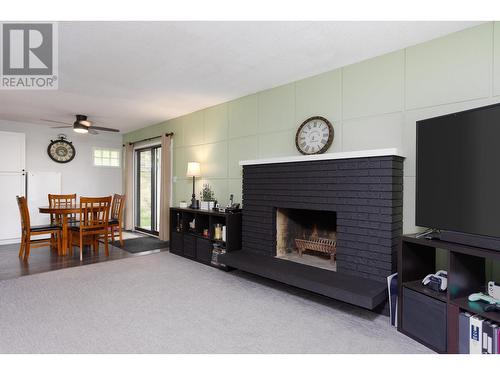 1269 Lund Road, Kelowna, BC - Indoor Photo Showing Living Room With Fireplace