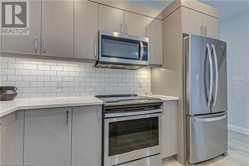 360 Quarter Townline Road Unit# 304, Tillsonburg, ON - Indoor Photo Showing Kitchen With Stainless Steel Kitchen