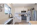 2724 Riffington Place, West Kelowna, BC  - Indoor Photo Showing Kitchen With Stainless Steel Kitchen With Double Sink 