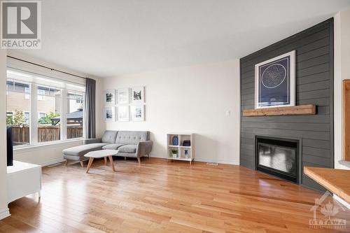 980 Bunchberry Way, Ottawa, ON - Indoor Photo Showing Living Room With Fireplace