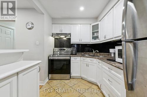 59 - 3025 Cedarglen Gate, Mississauga, ON - Indoor Photo Showing Kitchen