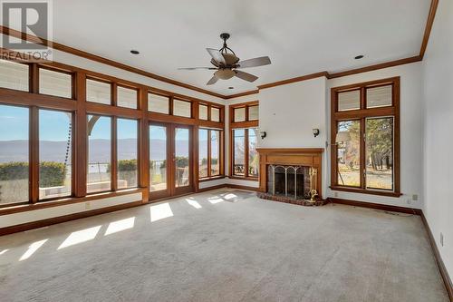 1419 West Kelowna Road, West Kelowna, BC - Indoor Photo Showing Other Room With Fireplace