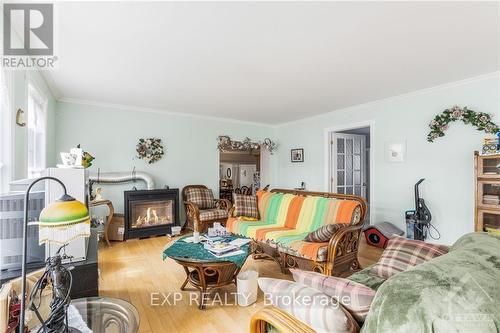 53 High Street, Champlain, ON - Indoor Photo Showing Living Room With Fireplace