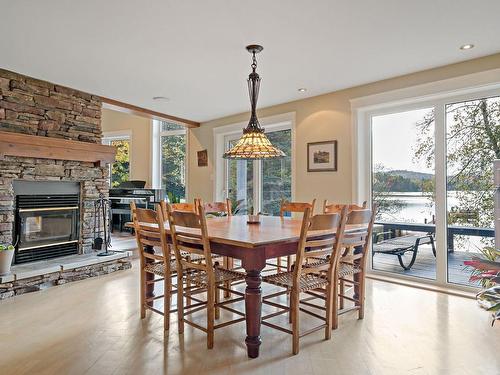 Dining room - 965 Ch. Morgan, Saint-Adolphe-D'Howard, QC - Indoor Photo Showing Dining Room With Fireplace