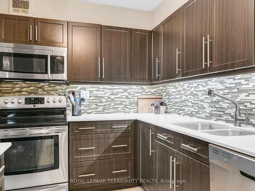 701-15 La Rose Ave, Toronto, ON - Indoor Photo Showing Kitchen With Stainless Steel Kitchen With Double Sink With Upgraded Kitchen