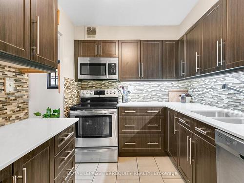 701-15 La Rose Ave, Toronto, ON - Indoor Photo Showing Kitchen With Stainless Steel Kitchen With Double Sink With Upgraded Kitchen