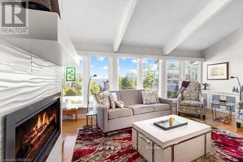 177 Isthmus Bay Road, Northern Bruce Peninsula, ON - Indoor Photo Showing Living Room With Fireplace