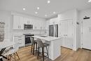 206-3434 Mckinley Beach Drive, Kelowna, BC  - Indoor Photo Showing Kitchen With Double Sink With Upgraded Kitchen 