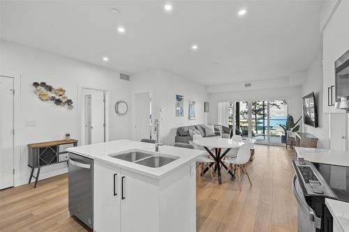 206-3434 Mckinley Beach Drive, Kelowna, BC - Indoor Photo Showing Kitchen With Double Sink