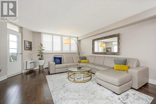 1202 - 81 Millside Drive, Milton, ON - Indoor Photo Showing Living Room