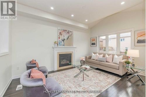 22 Long Branch Trail, Brampton, ON - Indoor Photo Showing Living Room With Fireplace