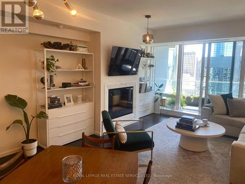 3007 - 180 University Avenue, Toronto, ON - Indoor Photo Showing Living Room With Fireplace