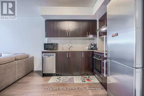 406 - 255 Village Green Square, Toronto, ON - Indoor Photo Showing Kitchen