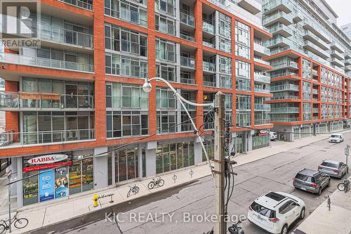 215 - 140 Simcoe Street, Toronto, ON - Outdoor With Facade