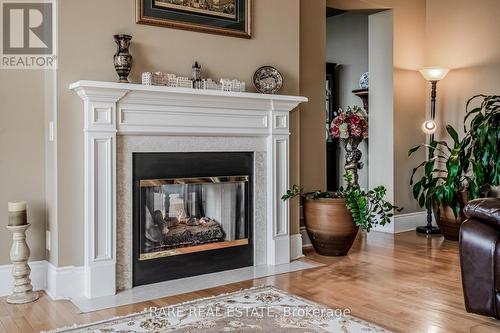 Tph6 - 25 Kingsbridge Garden Circle, Mississauga, ON - Indoor Photo Showing Living Room With Fireplace