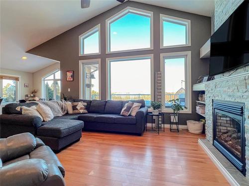 53011 108W Road, Brandon, MB - Indoor Photo Showing Living Room With Fireplace