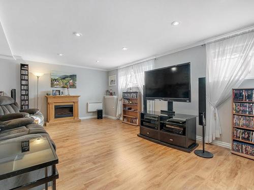 Family room - 509 Rue Lacasse, Terrebonne (Terrebonne), QC - Indoor Photo Showing Living Room With Fireplace