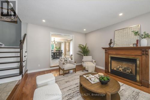 6907 Lambeth Walk, London, ON - Indoor Photo Showing Living Room With Fireplace