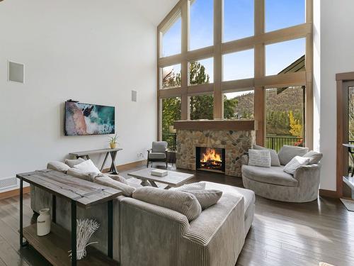 1966 Hidden Lake Place, Kelowna, BC - Indoor Photo Showing Living Room With Fireplace