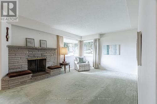 36 Queen Street, Thames Centre (Dorchester), ON - Indoor Photo Showing Living Room With Fireplace