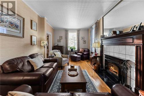 321 Centre Street, Pembroke, ON - Indoor Photo Showing Living Room With Fireplace