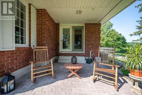 Covered rear patio - 20118 17 Highway, Cobden, ON - Outdoor With Deck Patio Veranda With Exterior