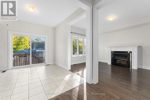 66 White Crescent, Barrie, ON - Indoor Photo Showing Living Room With Fireplace