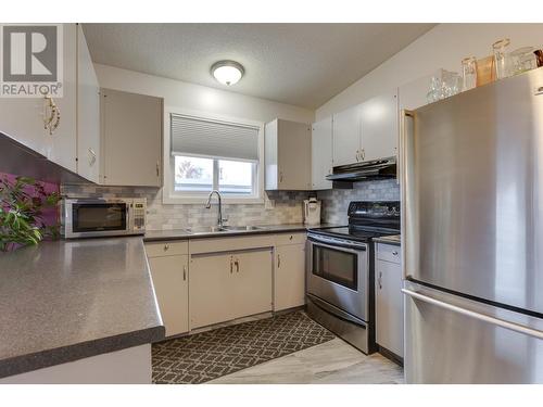 1250 Aleza Crescent, Prince George, BC - Indoor Photo Showing Kitchen With Double Sink