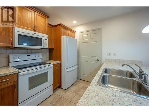 2125 Atkinson Street Unit# 603, Penticton, BC - Indoor Photo Showing Kitchen With Double Sink