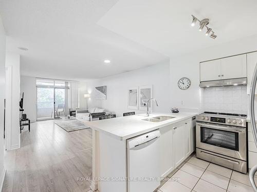 413-35 Kingsbridge Garden Circ, Mississauga, ON - Indoor Photo Showing Kitchen With Double Sink