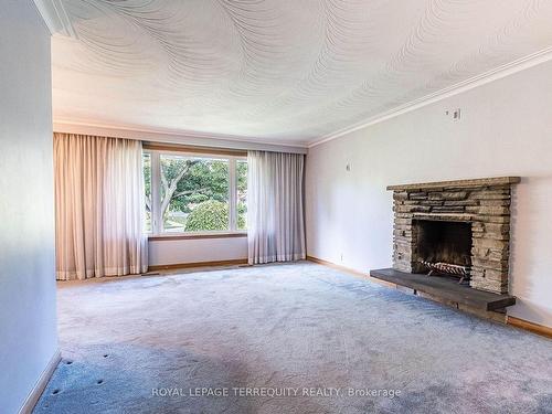 390 Renforth Dr, Toronto, ON - Indoor Photo Showing Other Room With Fireplace