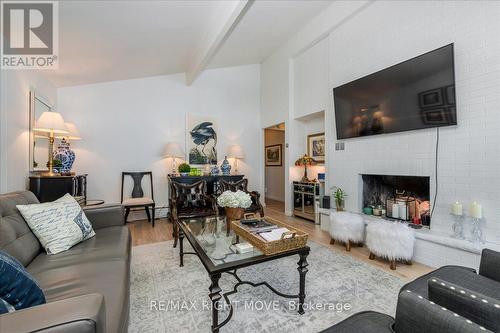 18 Maple Drive, Orillia, ON - Indoor Photo Showing Living Room With Fireplace