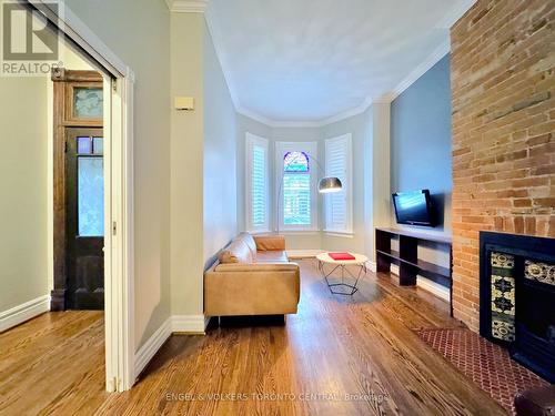 57 Metcalfe Street, Toronto, ON - Indoor Photo Showing Living Room With Fireplace