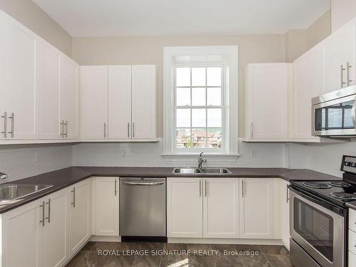 422-33 Whitmer St, Milton, ON - Indoor Photo Showing Kitchen With Stainless Steel Kitchen With Double Sink