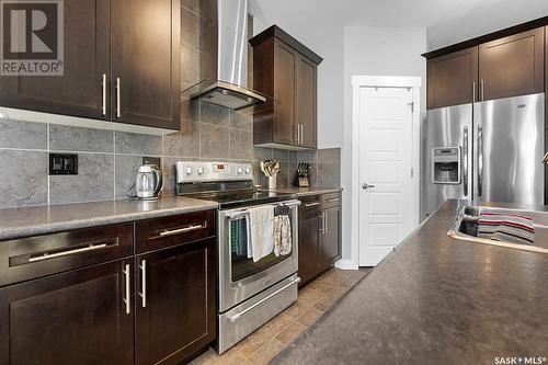 5689 Pearsall Crescent, Regina, SK - Indoor Photo Showing Kitchen With Stainless Steel Kitchen