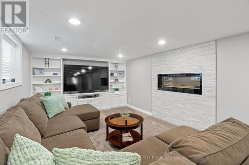 76 Sanders Street W, South Huron (Exeter), ON - Indoor Photo Showing Living Room With Fireplace