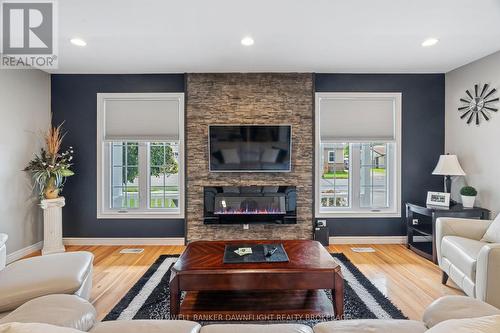 76 Sanders Street W, South Huron (Exeter), ON - Indoor Photo Showing Living Room With Fireplace