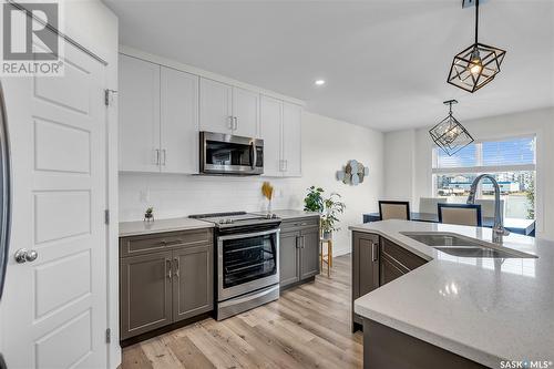 2070 Stilling Lane, Saskatoon, SK - Indoor Photo Showing Kitchen With Double Sink With Upgraded Kitchen