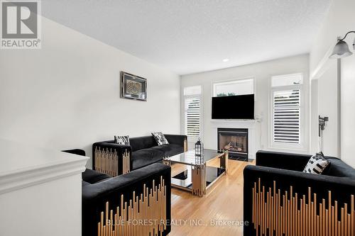 17 - 578 Mcgarrell Place, London, ON - Indoor Photo Showing Living Room With Fireplace