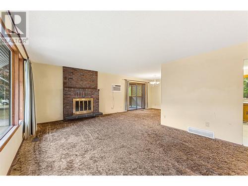 280 Prior Road N, Kelowna, BC - Indoor With Fireplace