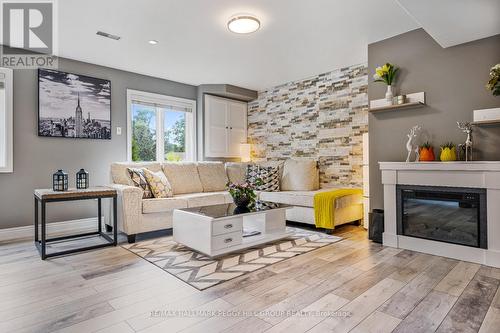 13 Bridle Trail, Springwater, ON - Indoor Photo Showing Living Room With Fireplace