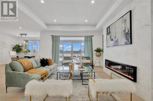 11 Cypress Pointe, Leamington, ON - Indoor Photo Showing Living Room With Fireplace