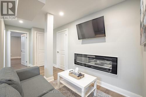 4 Lockman Drive, Hamilton, ON - Indoor Photo Showing Living Room With Fireplace