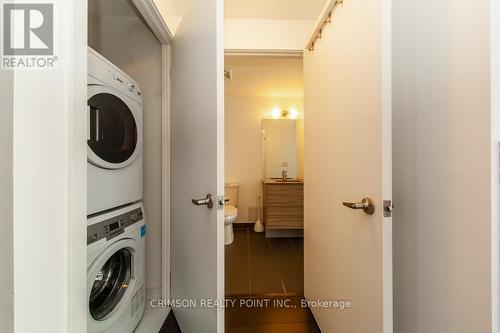 1614 - 210 Simcoe Street, Toronto, ON - Indoor Photo Showing Laundry Room