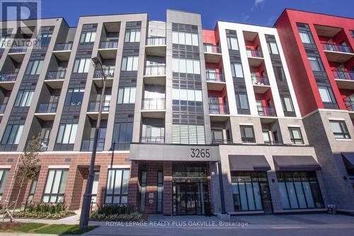 302 - 3265 Carding Mill Trail, Oakville, ON - Outdoor With Balcony With Facade