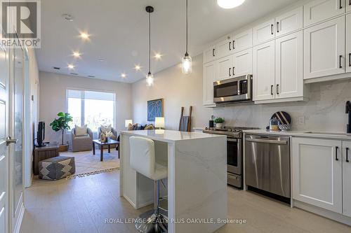 302 - 3265 Carding Mill Trail, Oakville, ON - Indoor Photo Showing Kitchen With Stainless Steel Kitchen With Upgraded Kitchen